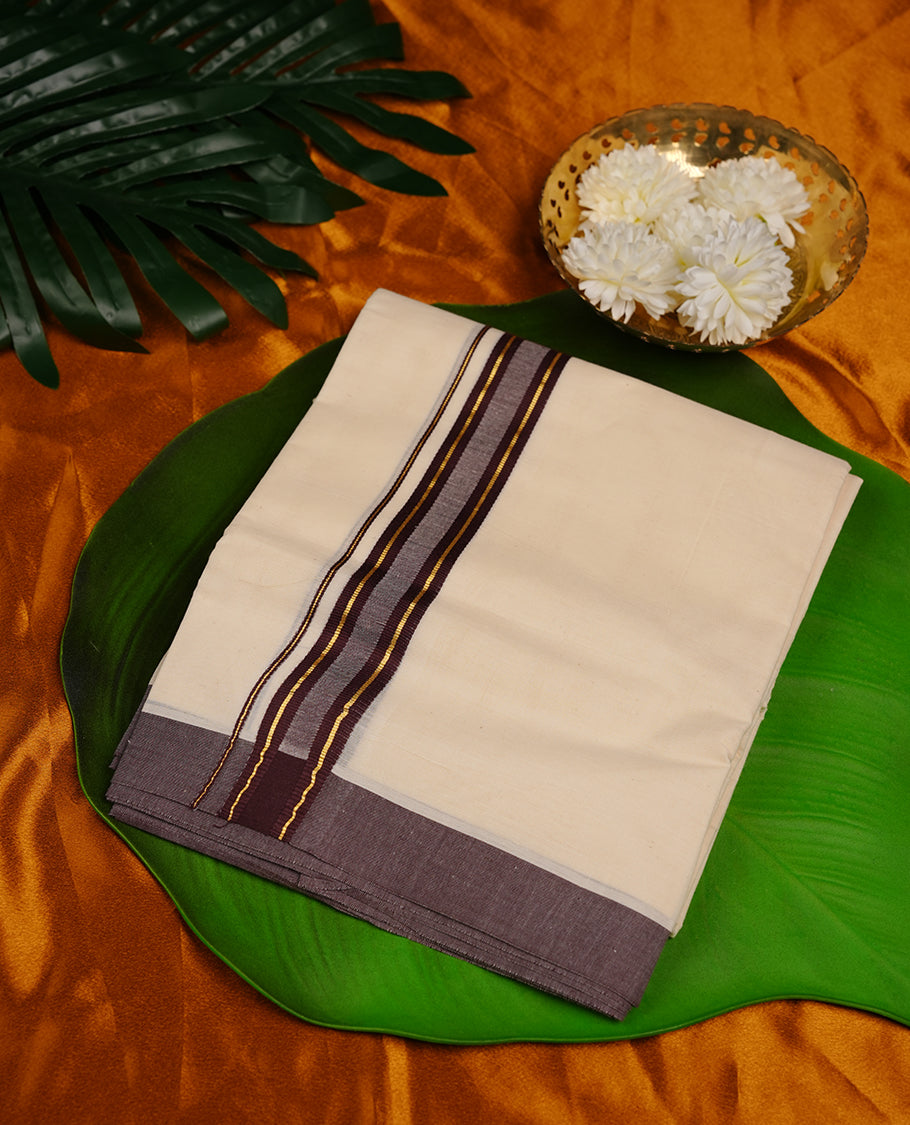 Cream colour cotton double dhoti featuring brown and gold zari border