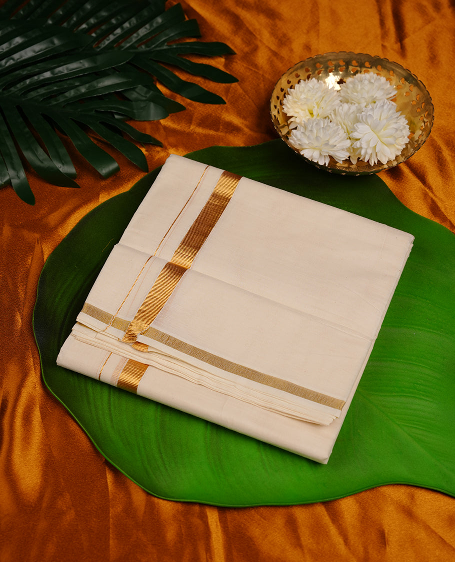 Cream colour cotton double dhoti featuring 1 inch gold kasavu zari border