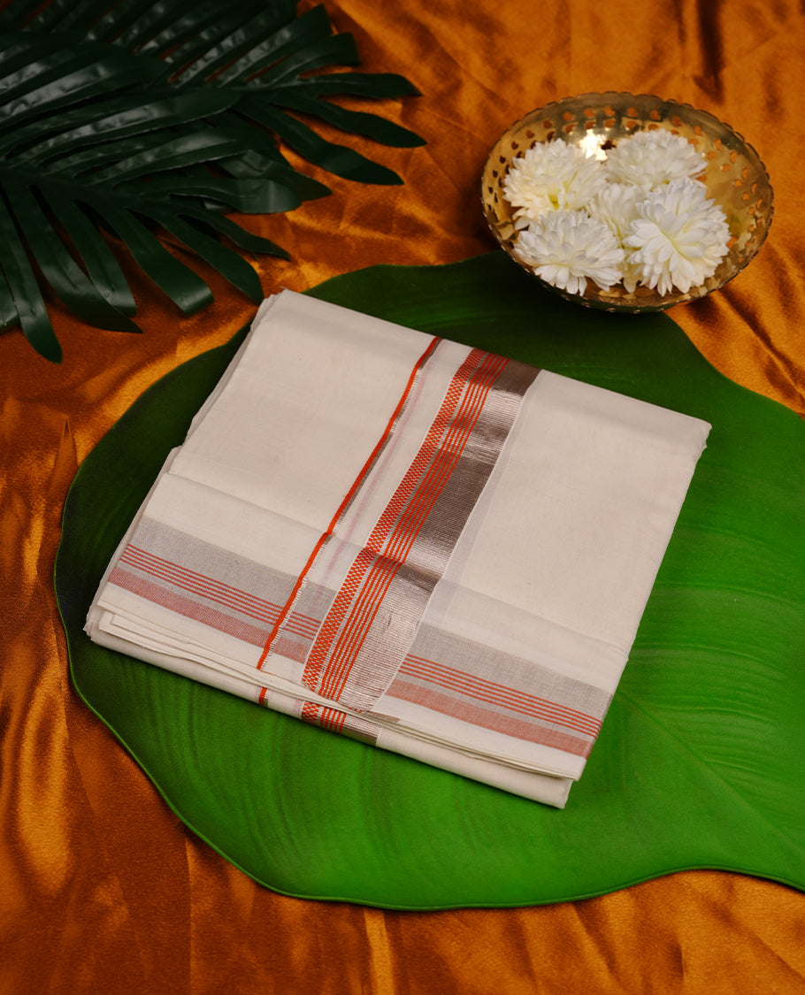 Cream colour cotton double dhoti featuring orange and silver colour zari border