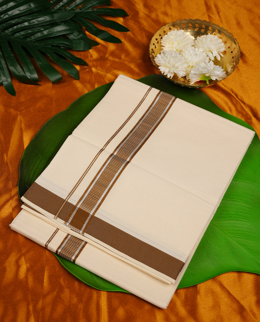 Cream colour MCR double dhoti featuring Mehendi green and silver colour kasavu zari border