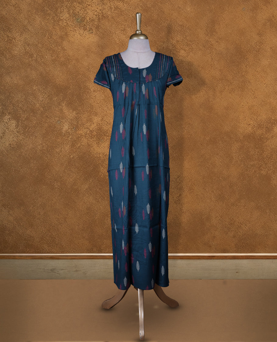 Dark cyan colour NStyle nighty featuring coloured Leaf pattern, a U neckline with pipe details , short sleeves, and a full ankle-length design.