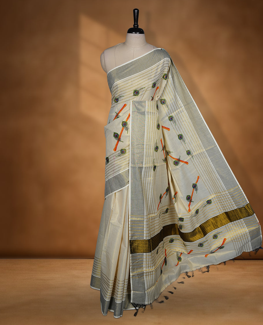 Light gold colour Tissue Kerala saree featuring a Plain body, an intricately woven gold and black traditional border and stripes and peacock leaf pattern on pallu, paired with a matching blouse.
