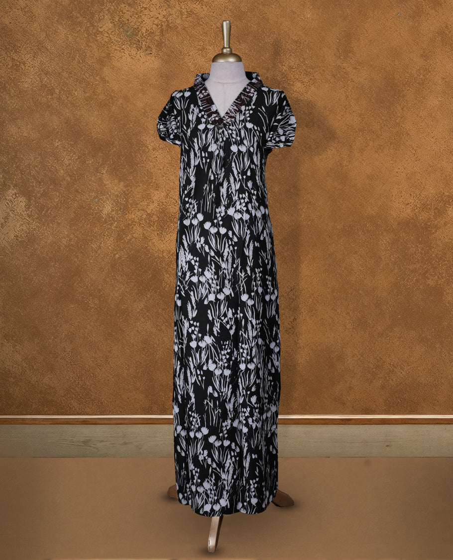 Dark green colour NStyle nighty featuring White floral patterns, a V neckline with thread pattern, short sleeves, and a full ankle-length design.