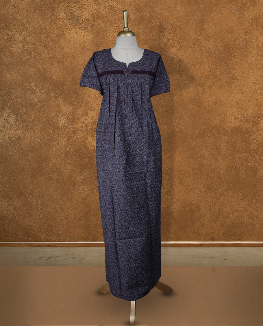 Dark purple colour NStyle nighty featuring gray floral patterns, a round neckline with spilt V, short sleeves, and a full ankle-length design.
