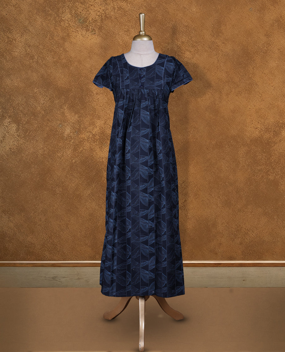 Dark Blue colour Nstyle nighty with featuring a light blue floral pattern, round neckline with light blue lace detailing, Short sleeve, and a full-length