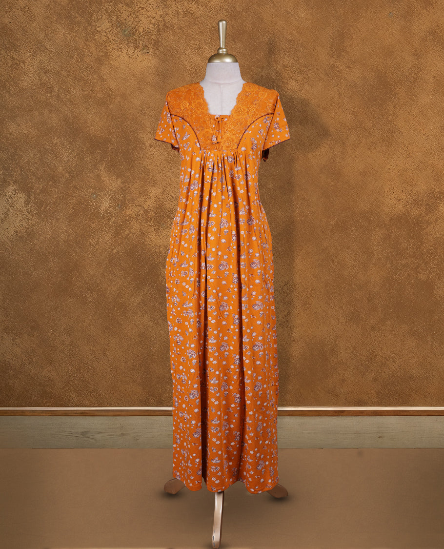 Orange colour NStyle nighty featuring Floral patterns, a Round neckline, short sleeves, and a full ankle-length design.