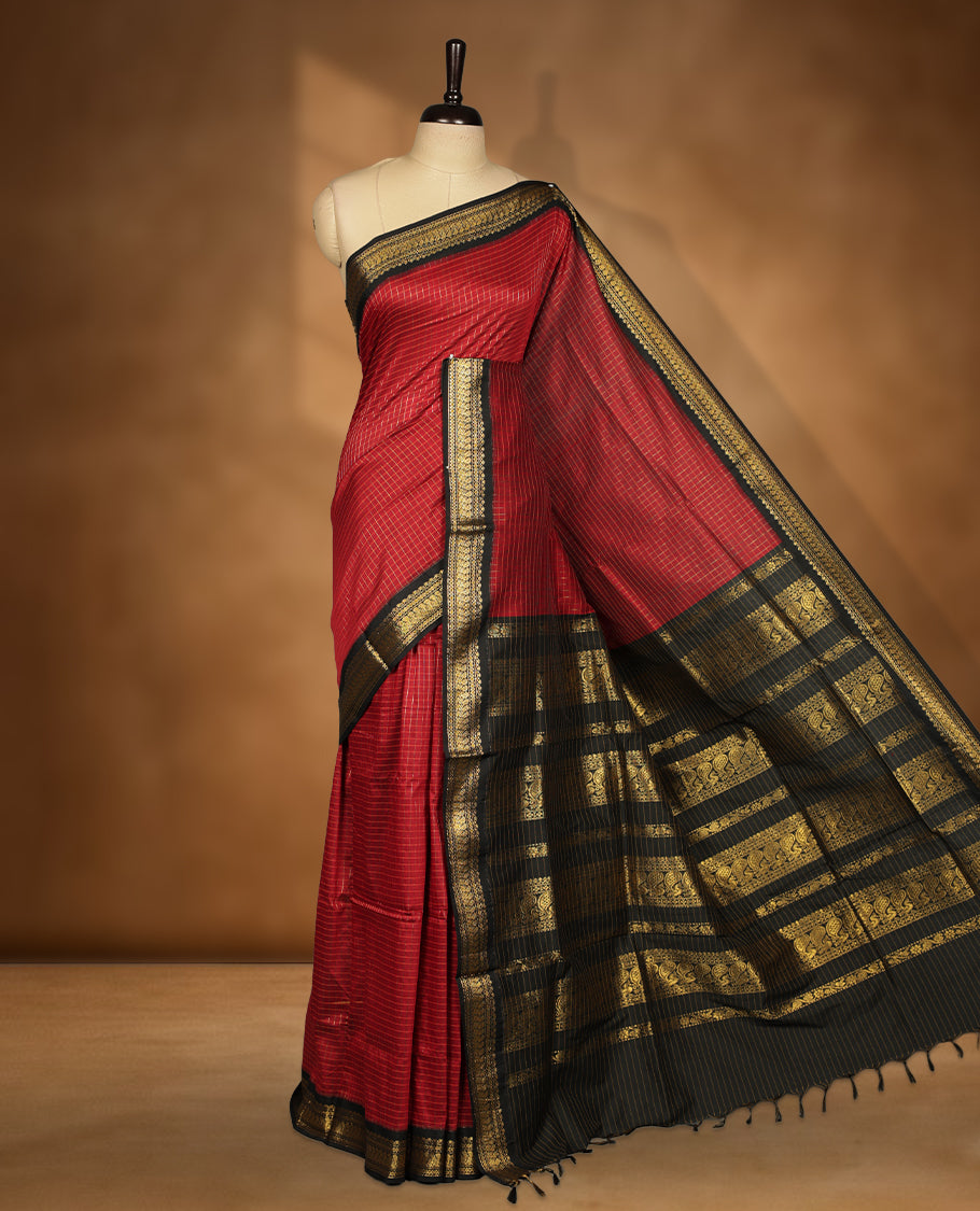 Maroon colour kalyani cotton saree featuring Antique zari check pattern on body, contrast Black colour border with antique zari pattern, paired with matching blouse piece.