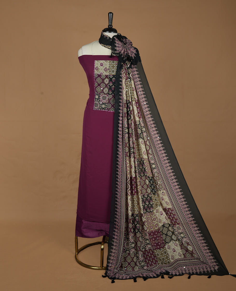Wine colour georgette salwar suit collection featuring plain body enhanced with elegant black bunch kalamkari print on neck yoke, detailed with subtle mirror work , paired with kalamkari printed dupatta with mirror work with santon material bottom.
