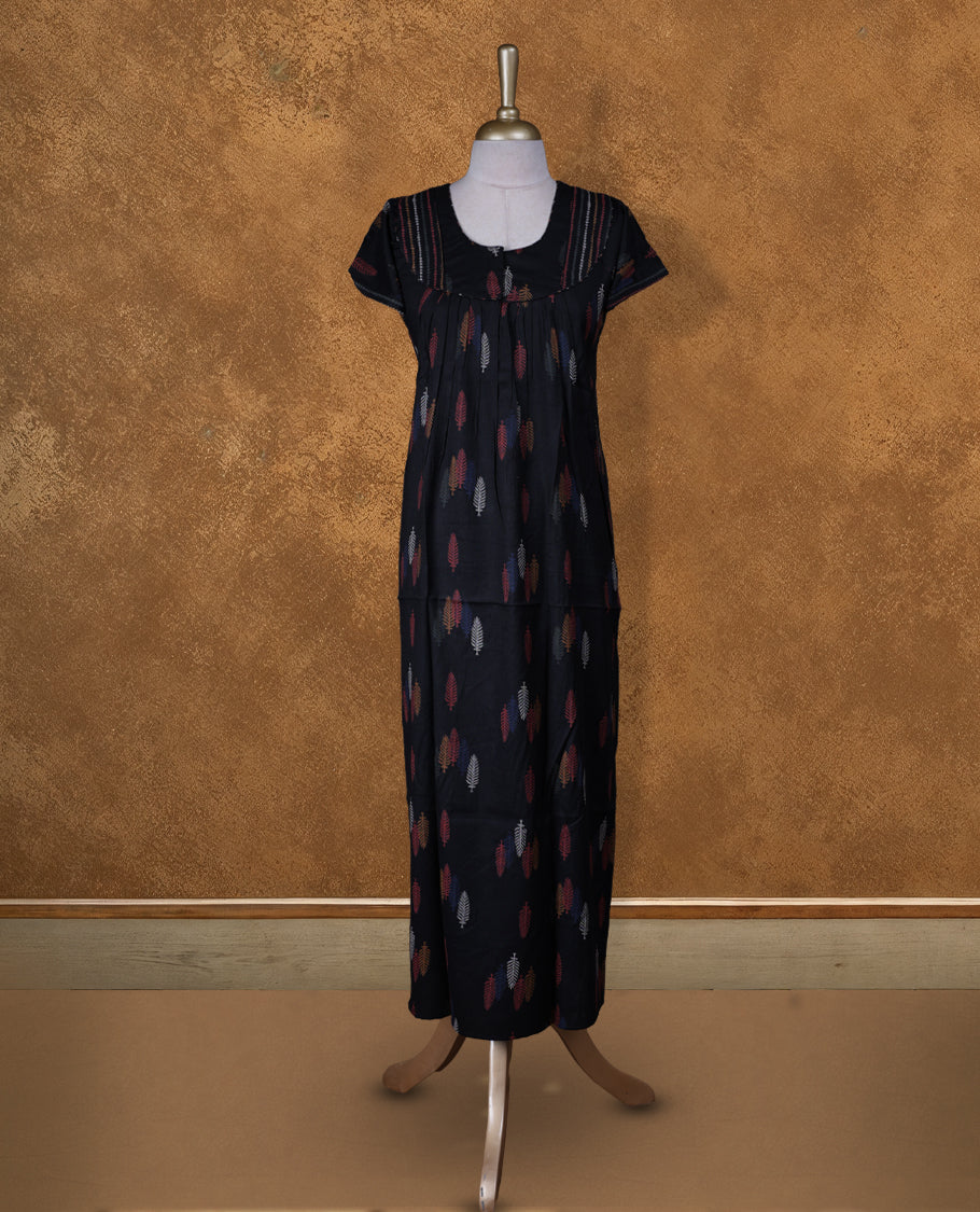 Black colour NStyle nighty featuring coloured Leaf patterns, a Round neckline , short sleeves, and a full ankle-length design.