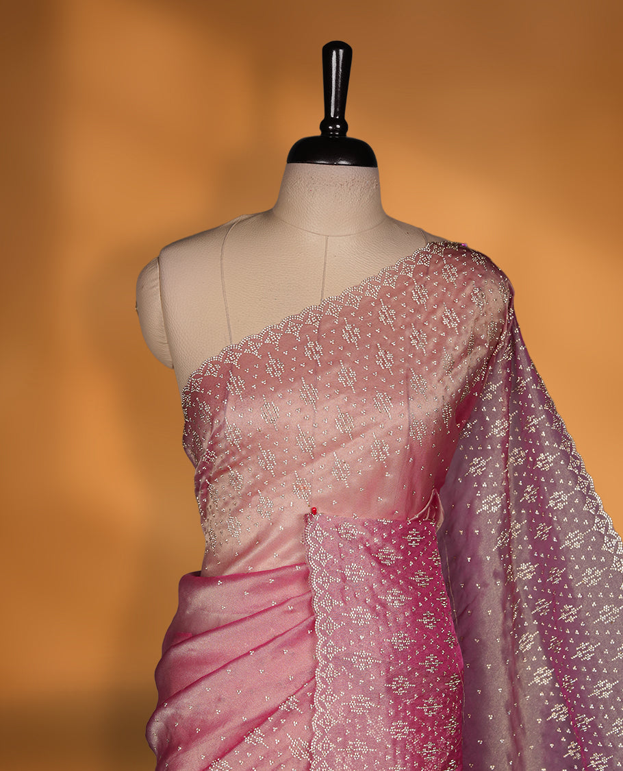 Pink Colour Shimmer Designer Saree featuring Delicate White Stone Scattered Work on the Body, enhanced with Intricate Stone Detailing on the Border and Pallu, paired with a Matching Blouse.