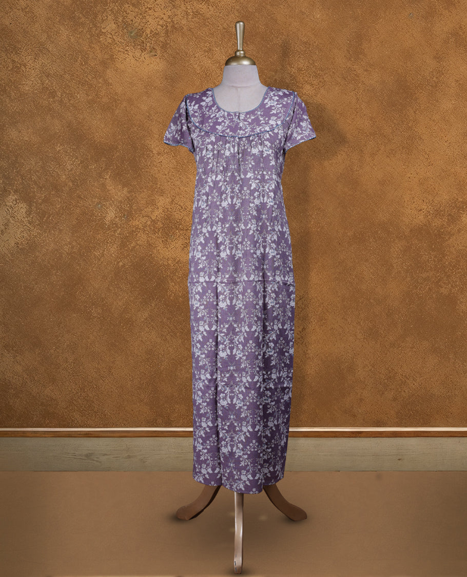 Dusty lavender colour Nstyle nighty with featuring a White floral pattern, a round neckline with lace detailing, Short sleeve, and a full-length