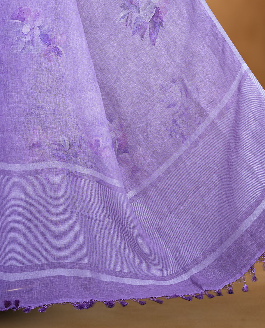 Light purple colour pure linen saree featuring Floral print pattern across body, silver thin border finished with matching blouse.