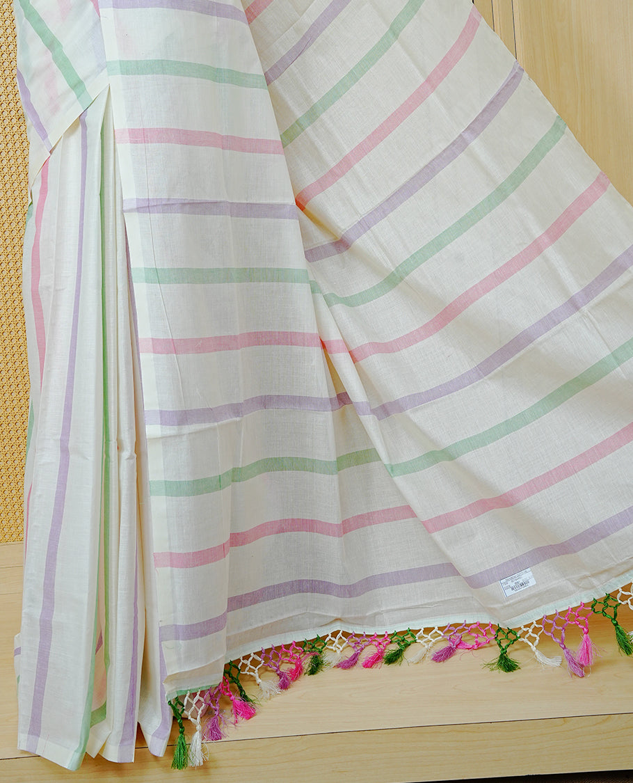 Cream Colour Cotton Kerala Saree Featuring Pink, Green and Lavender Stripes Across the Body, Complemented by a Matching Striped Pallu, Multicolour Tassels, and a Matching Blouse Piece.
