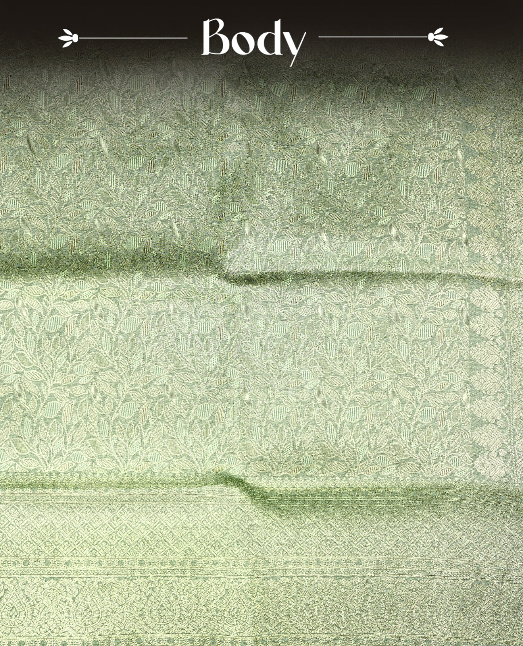 Pistachio Colour Softie Silk Saree Featuring An All Over Gold Woven Leaf Pattern, Finished With A Matching Border Adorned With Intricate Paisley And Floral Motifs, Paired With A Matching Blouse Piece.