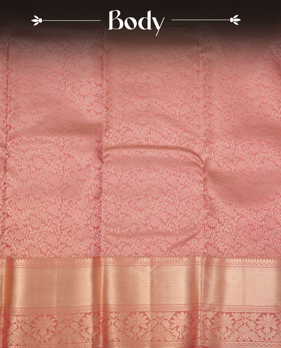 Powder pink Kancheepuram silk saree featuring floral jacquard on the body with a traditional border, paired with a matching blouse piece.