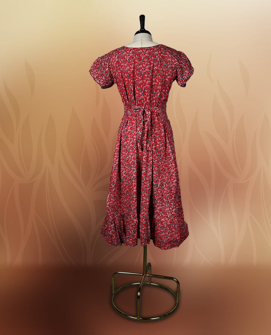 Red colour printed nightwear with floral patterns, V neckline, and short puff sleeves, Tailored for a flattering fit with a flared hem & perfect for casual outings or daily ethnic wear with comfort.