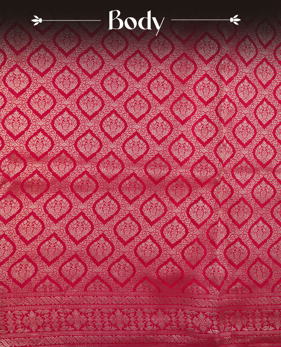 Rani pink colour banaras satin crepe saree featuring gold zari pattern across body, with self colour border with gold zari pattern and paired with matching blouse.