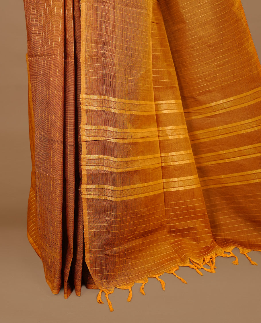 Mustard colour chettinad cotton saree featuring check pattern on body, complemented by self colour without border, paired with matching blouse piece.