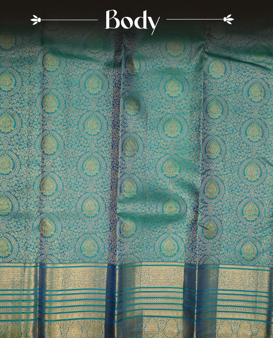 Peacock colour kancheepuram silk saree featuring gold zari pattern across body, complemented by selfcolour border traditional zari border, paired with matching blouse piece.