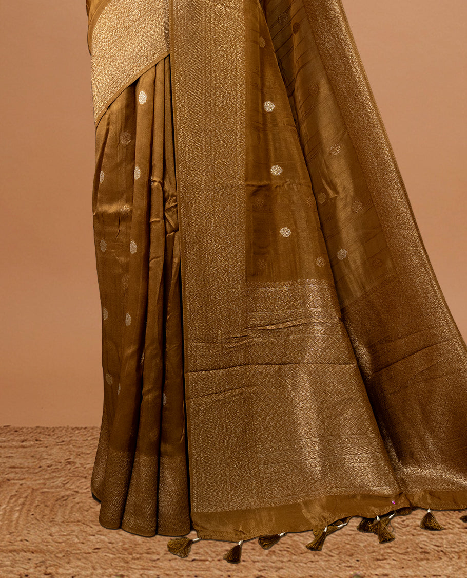 Burnt Mustard colour Semi banaras tussar georgette Saree featuring Antique zari motifs on body, enhanced with antique zari border, paired with a matching blouse piece.