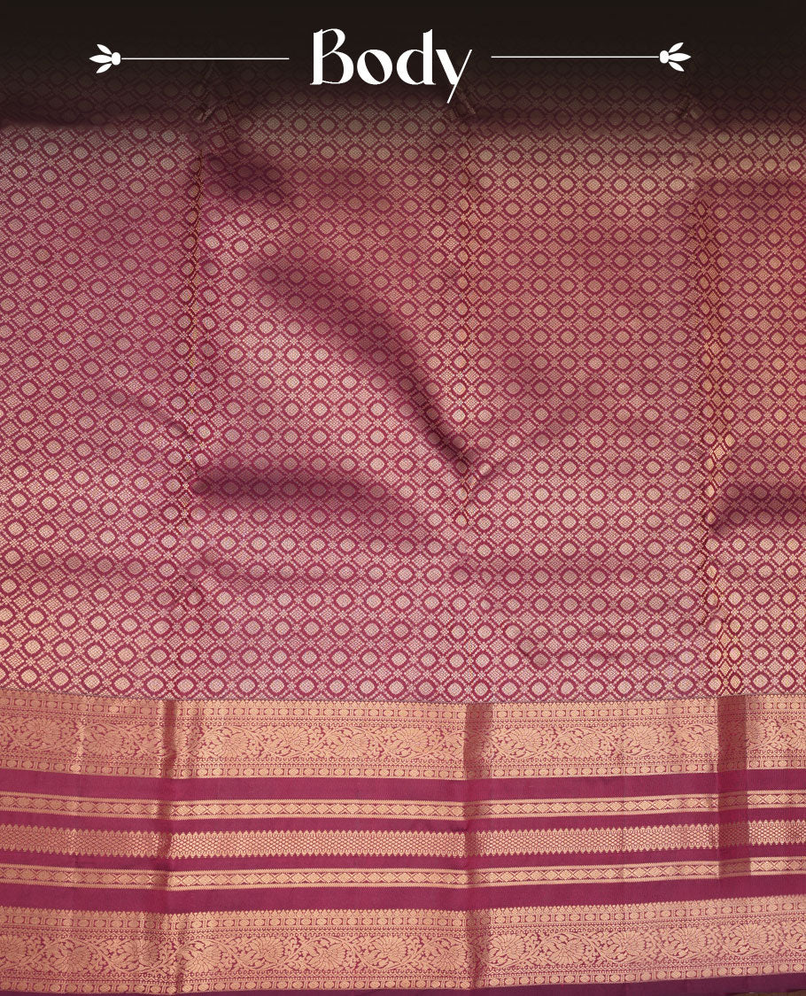 Wine maroon colour kancheepuram silk saree featuring Diamond pattern zari jacquard on body with traditional line border , paired with matching blouse piece.