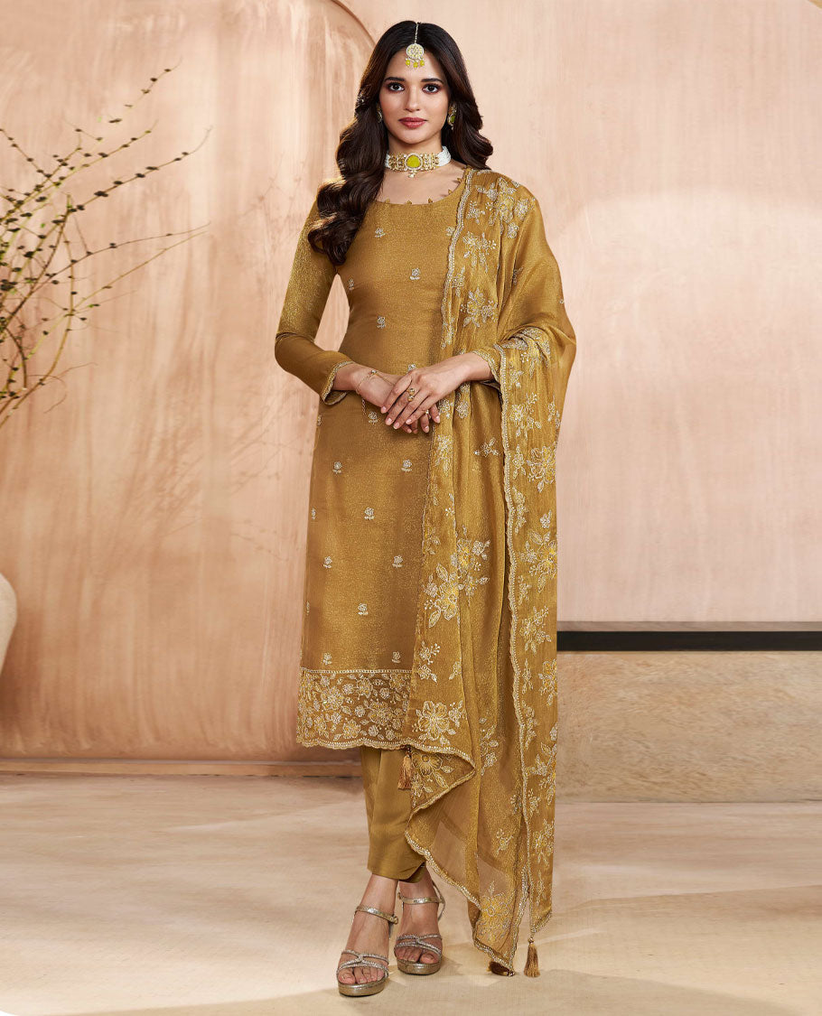 Gold colour silk suit material with heavy kurta embroidery and stone work, paired with premium soft santoon bottoms and a silk dupatta detailed with rich floral kodi work