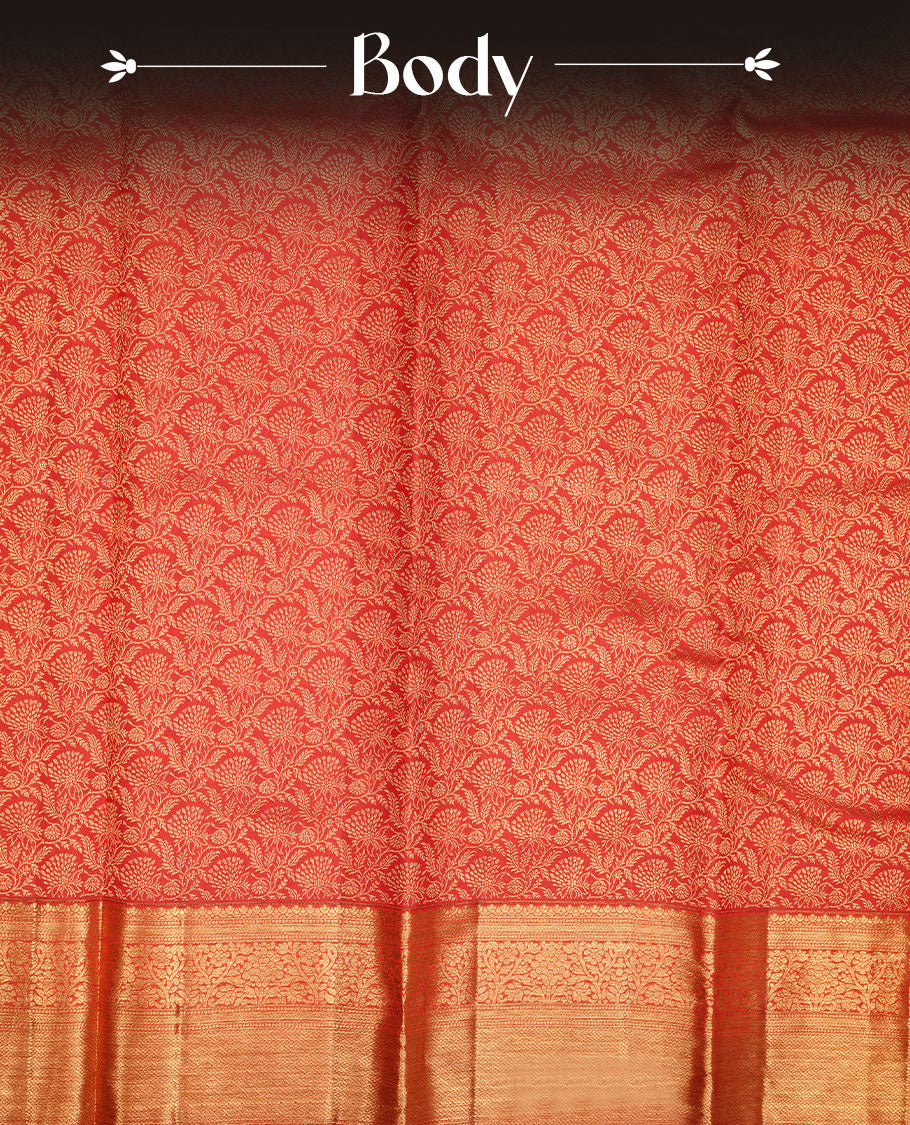 Brick Red colour kancheepuram silk saree featuring gold zari pattern across body, complemented by selfcolour border traditional zari border, paired with matching blouse piece.