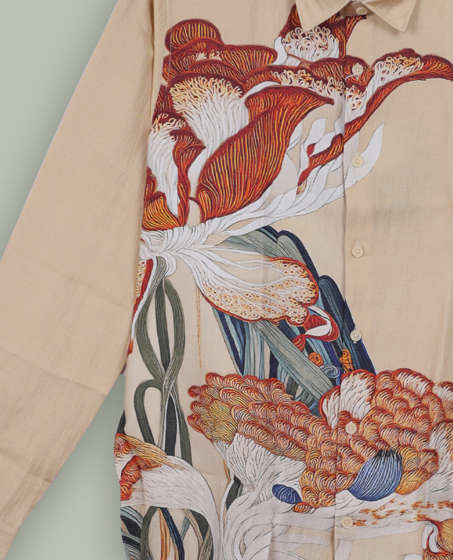 Beige colour shirt adorned with bold floral artwork in earthy tones, Crafted with a classic collar and full sleeves, it merges artistic expression with everyday elegance.