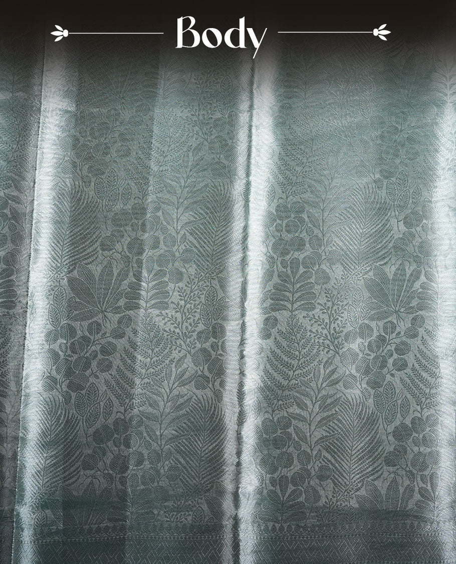 Light blue colour Pure banaras tissue silk saree featuring Silver zari brocade design across body, with silver zari brocade border, finished with a matching blouse.