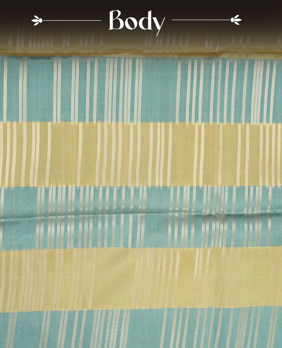Green and light teal colour semi tussar silk saree, featuring an intricate gold zari stripes on body and pallu , comes with matching blouse.