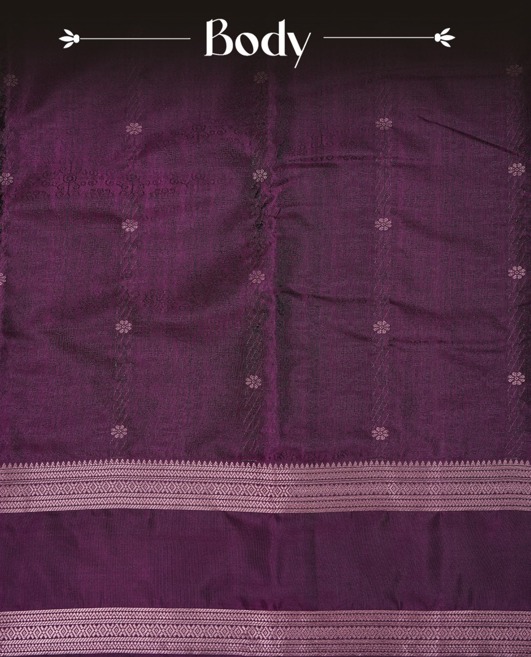 Grape Colour Semi Soft Slik Saree Featuring An Elegant Self Floral Woven Body, Enhanced By A Traditional Rose Gold Zari Border And Rich Pallu, Paired With A Matching Blouse Piece.