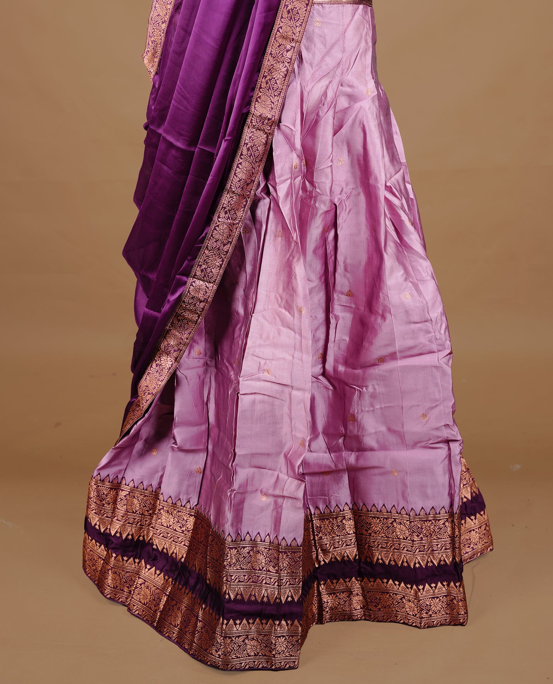 Pink colour semi stitched Half saree featuring contrast Deep purple colour with gold zari traditional border skirt, paired with matching zari border dupatta, unstitched blouse piece