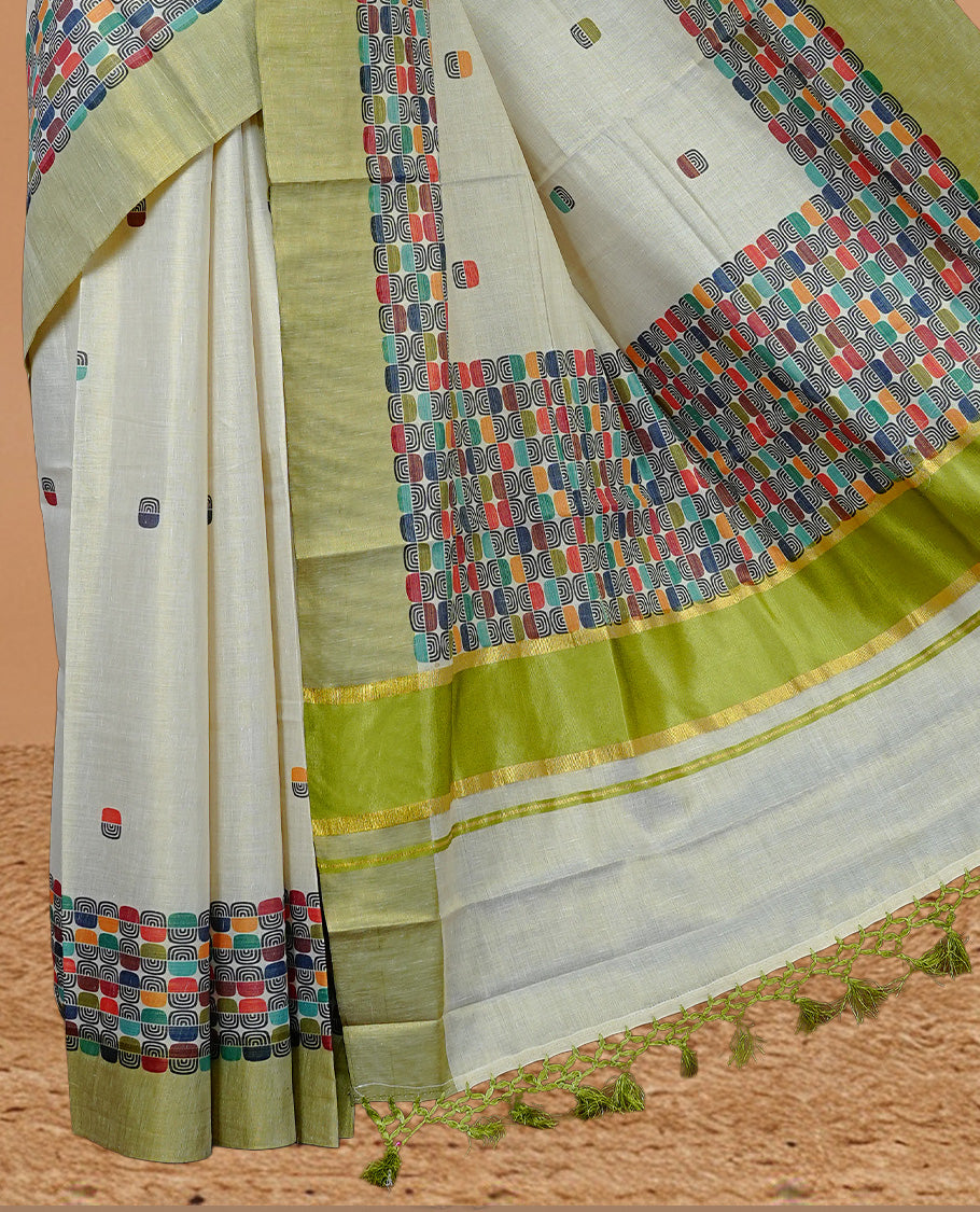 Cream Colour Tissue Kerala Saree Featuring A Classy Multicolour Box Pattern On The Body, Styled With A Green And Gold Zari Border And Pallu, Paired With A Matching Blouse Piece.