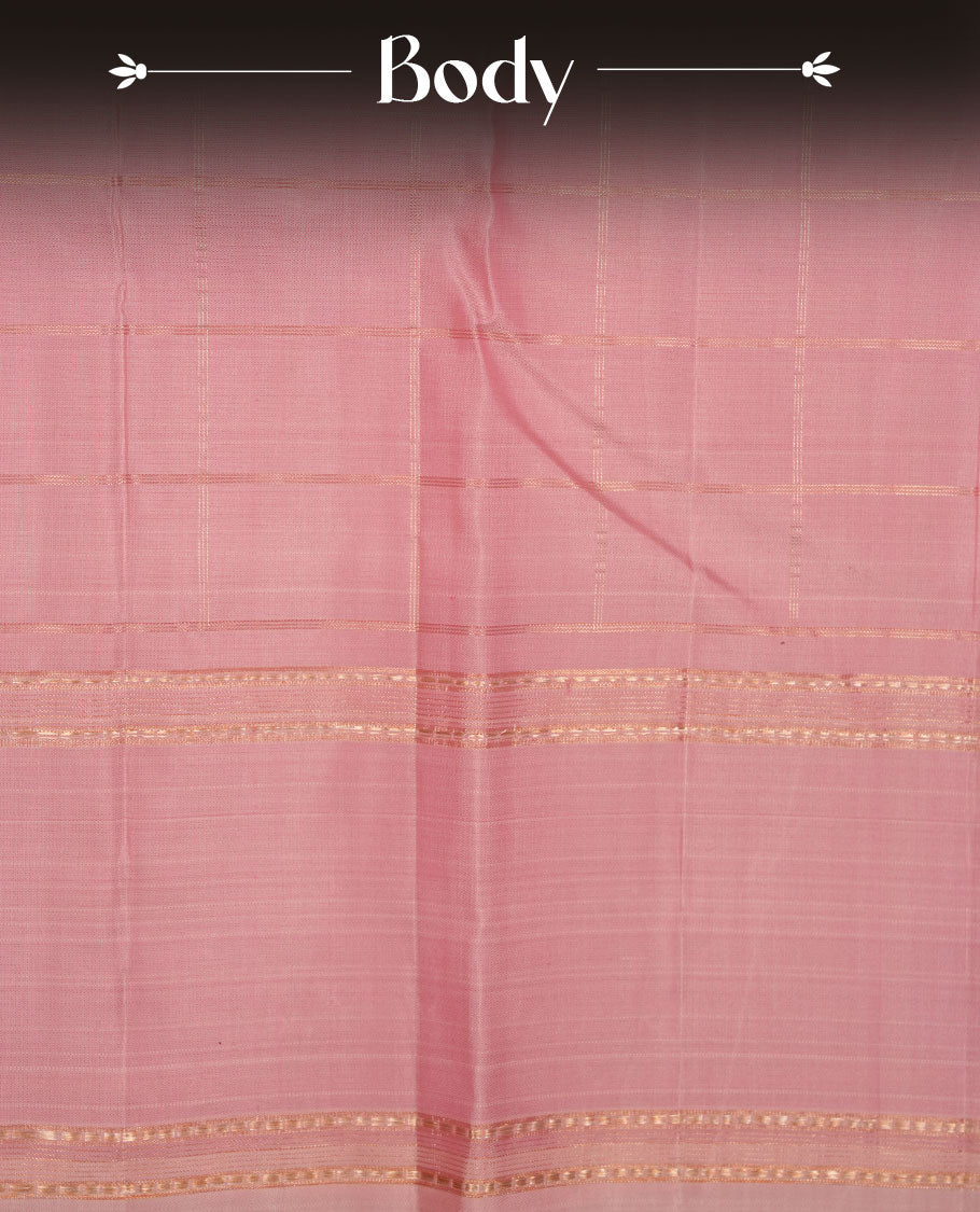 Dusty Pink colour pure traditional Kancheepuram silk saree adorned with gold zari Checks across the body, featuring simple borders, beautifully paired with a matching blouse piece.