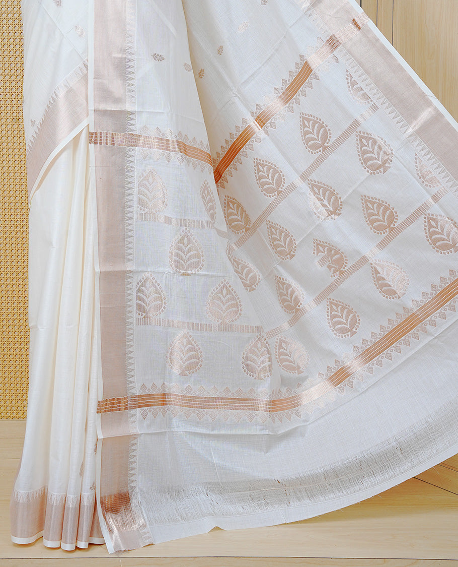 Cream Cotton Kerala Saree with Gold Zari Leaf Motifs, Gold Zari Leaf Pattern Border and Pallu, Paired with a Matching Blouse Piece.