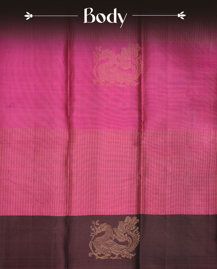 Pink colour soft silk saree featuring small zari check on body, complemented by contrast burgundy colour with peacock butta border, paired with matching blouse piece.