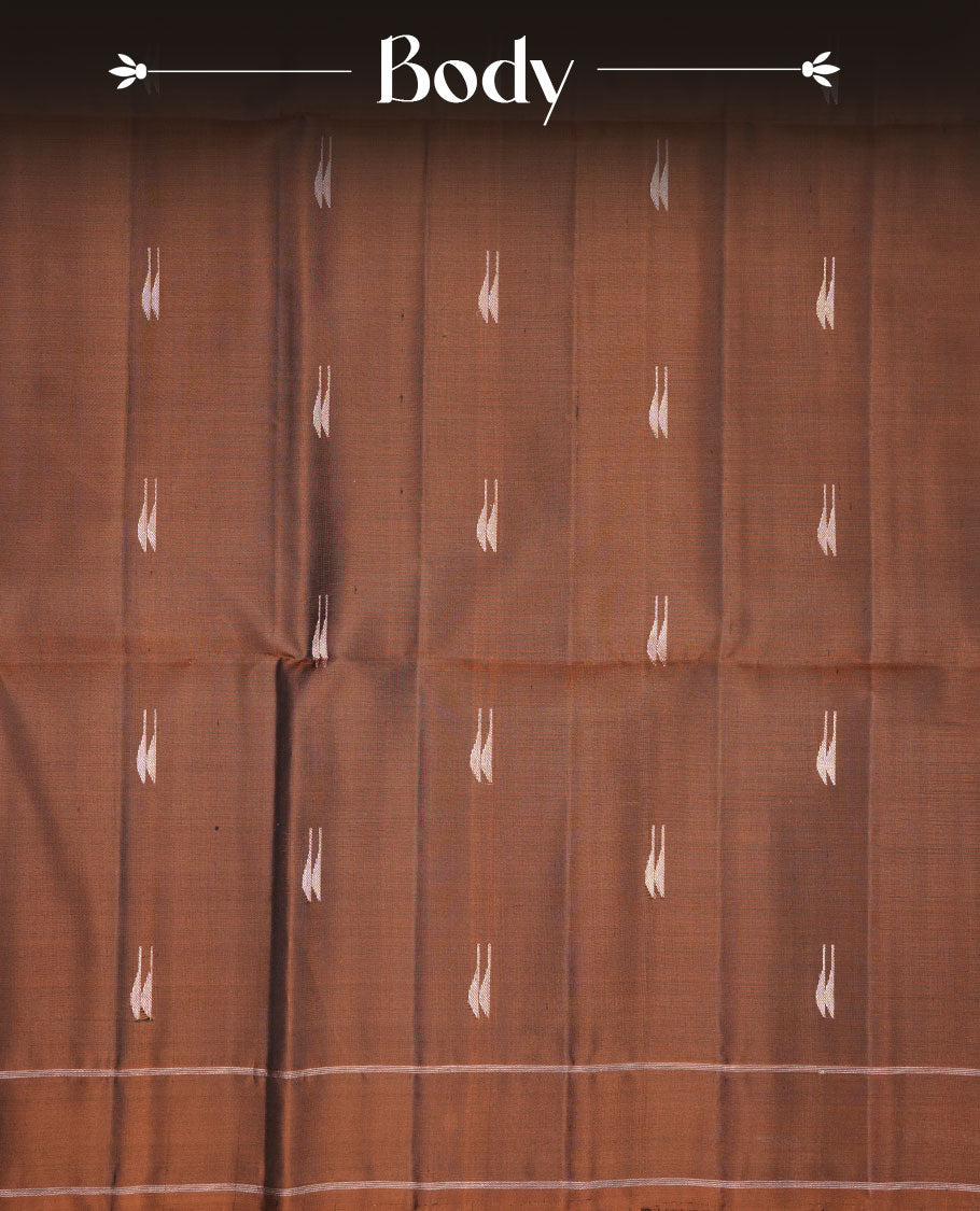 Olive Brown colour soft silk saree featuring gold zari motifs on body, complemented by self colour with traditional border with tassel at pallu, paired with matching blouse piece.
