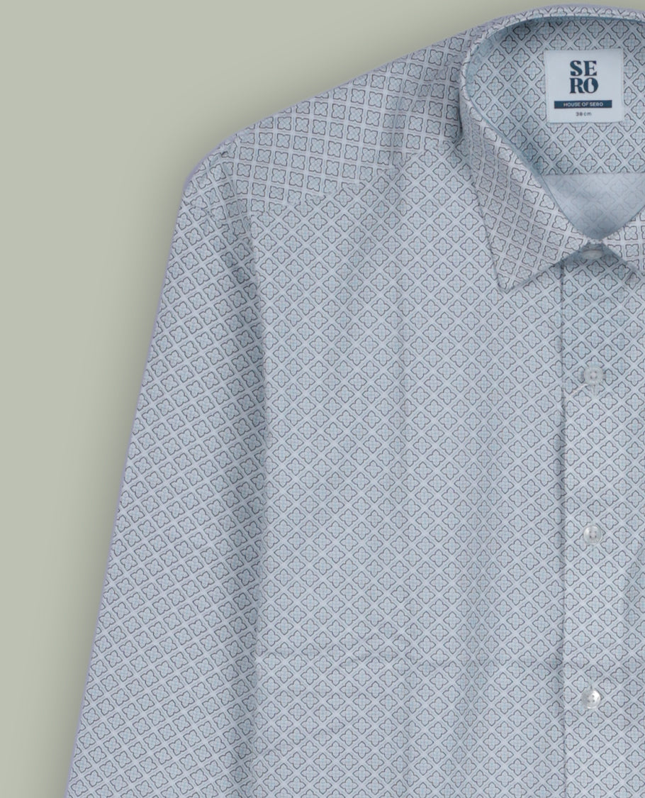 Light blue colour shirt with a subtle geometric pattern, featuring a classic spread collar and full sleeves & Made from premium quality fabric for softness and breathability.