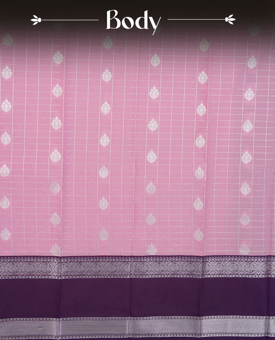 Lavender colour semi silk saree highlighting silver zari box pattern and motifs across body, featuring contrast silver colour border with gold zari pattern, comes with matching blouse .