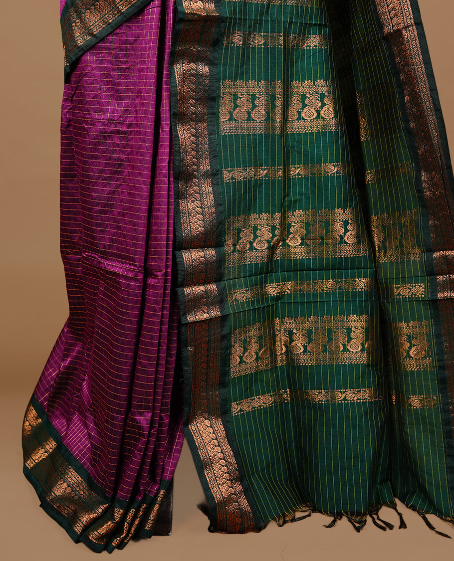 Purple colour kalyani cotton saree featuring gold zari check pattern on body, highlighting contrast green colour with Antique gold zari border, paired with matching blouse piece.