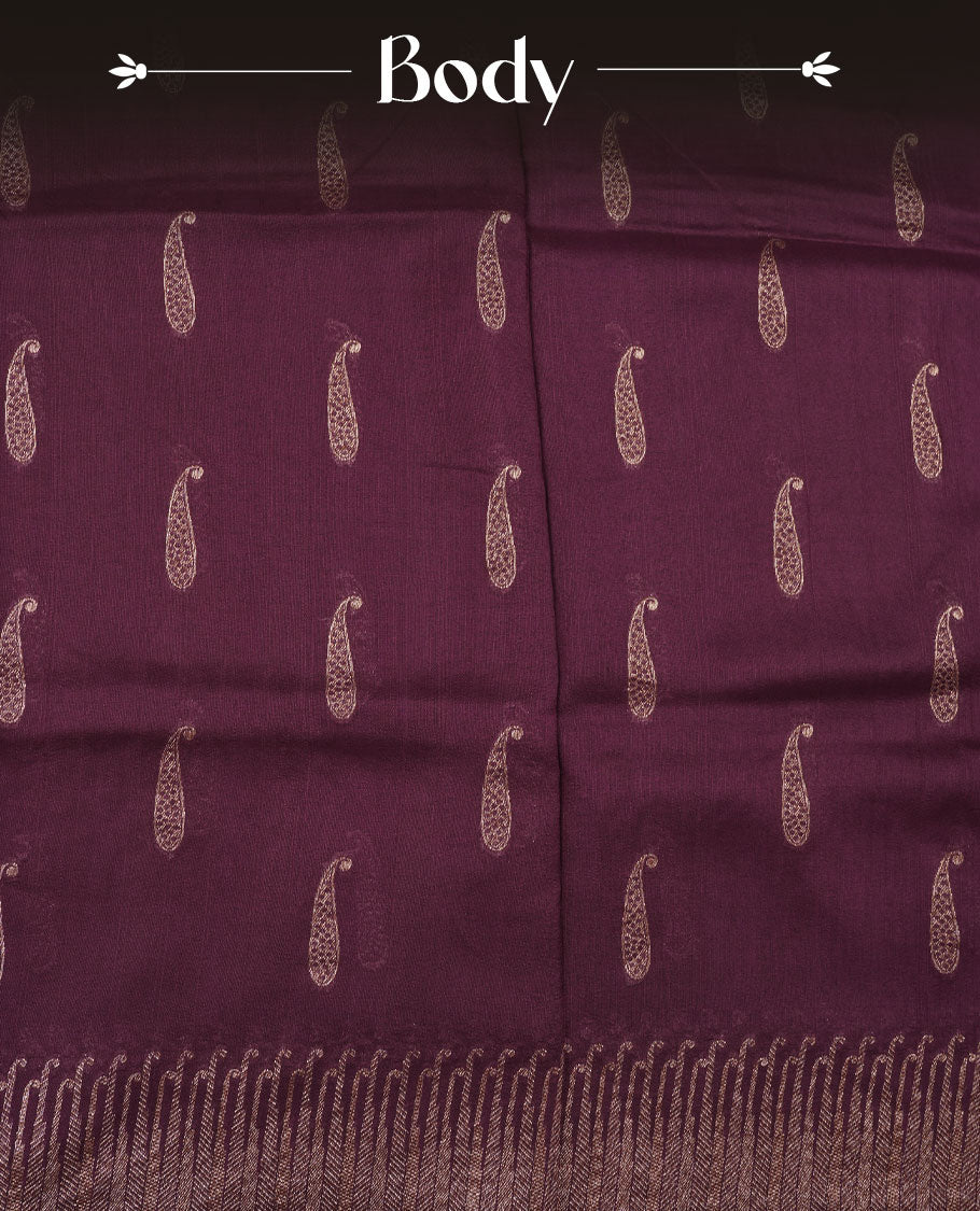 Chocolate brown colour semi banaras tussar georgette featuring gold zari leaf pattern across body, finished with gold zari border and paired with matching blouse.