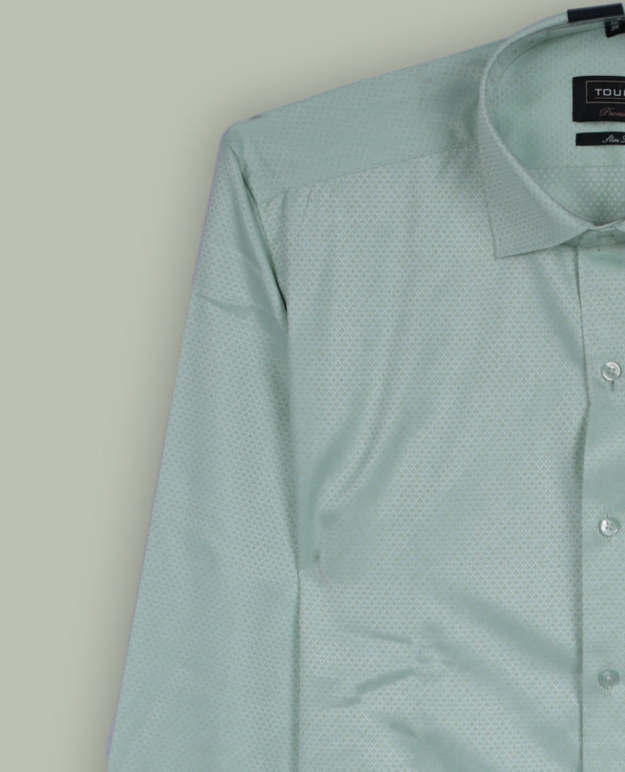 Light mint green colour long sleeve shirt with a subtle dotted pattern, Features a classic collar, front button closure, and single chest pocket & Made from smooth, breathable fabric.