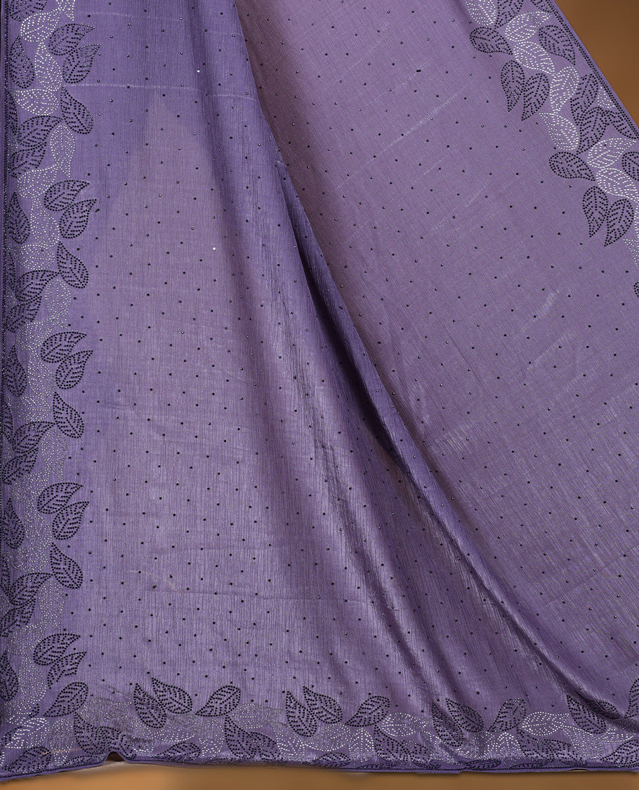 Dusty purple colour chiffon designer saree, featuring black and white scattered stone on body, stone work and heavy stone leaf pattern on border and pallu, Paired with matching blouse.