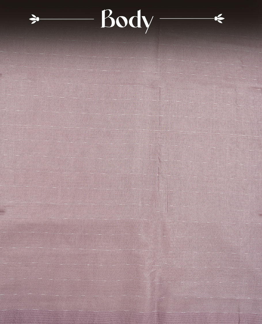 Light lavender colour semi jute saree highlighting gold zari striped body, without border and paired with matching blouse.