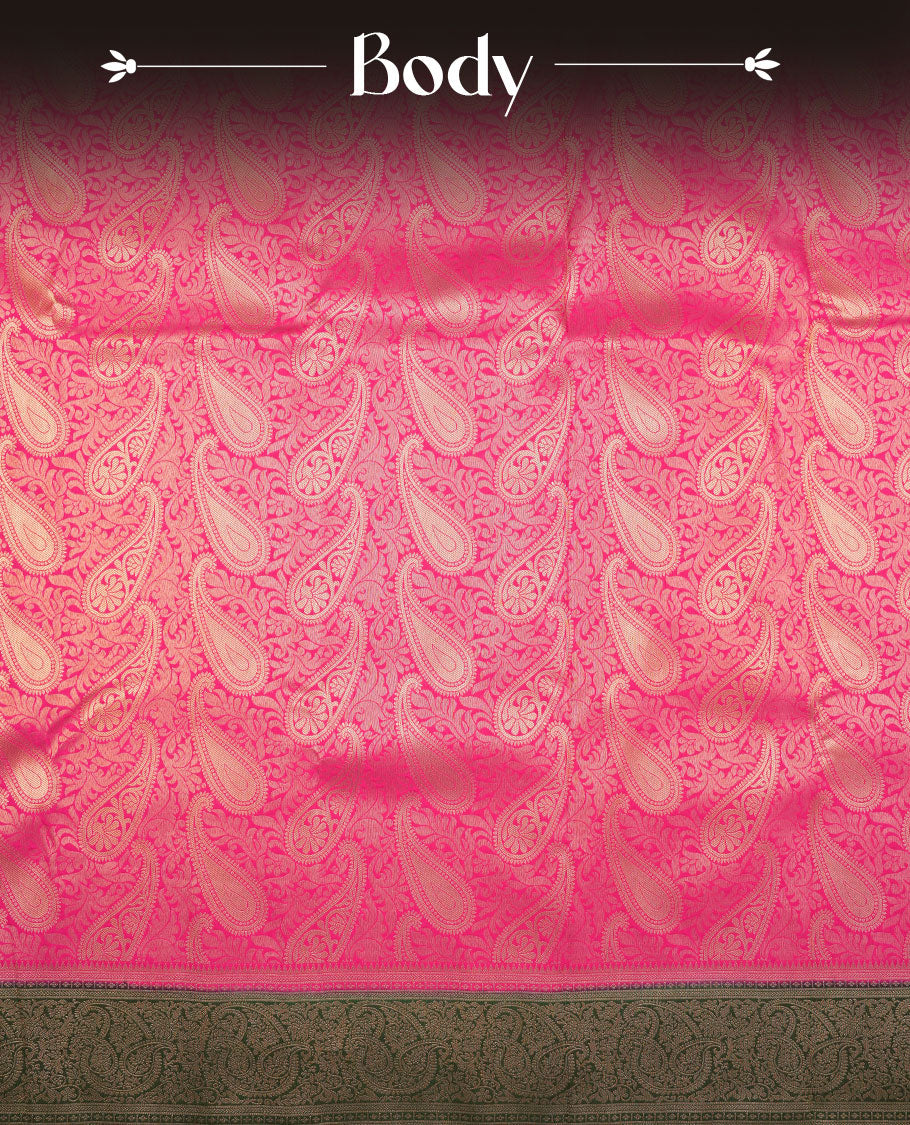 Magenta colour semi silk brocade saree featuring intricate Gold Floral kodi & leaf patterns across the body, complemented by a contrast Green colour woven border and pallu, paired with a matching blouse.