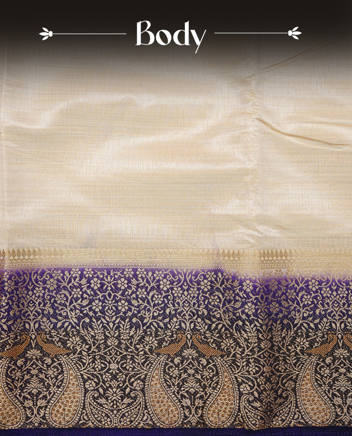 Light gold tussar saree featuring Elegant plain body, complemented by contrast Navy Blue colour with Gold zari Floral kodi with Peacock Pattern border, comes with matching blouse piece.