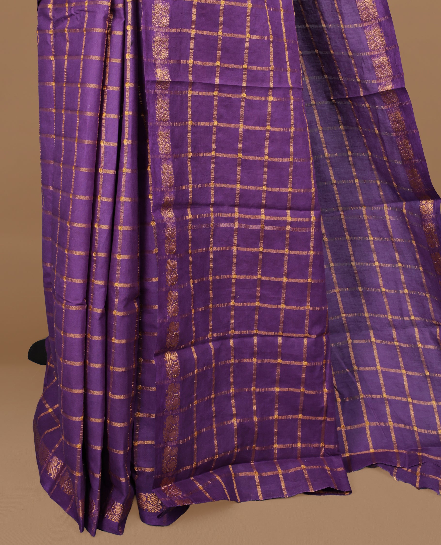 Violet colour Sungudi cotton saree featuring Gold zari Check pattern on body, Gold zari Peacock design on Self colour border, paired with matching blouse piece.
