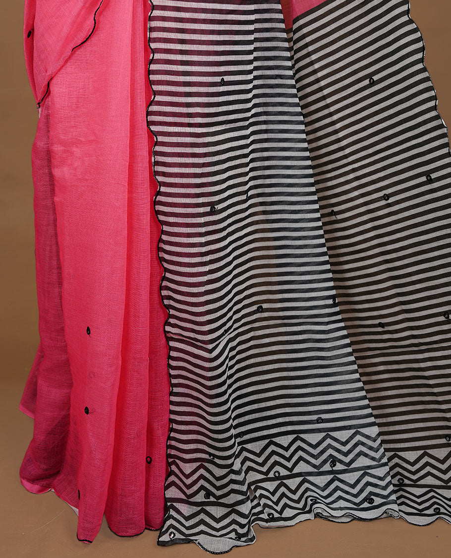 Pink colour Semi Linen saree featuring mirror work with intricate thread detailing, enhanced by a stylish scallop border. Comes without a blouse piece.