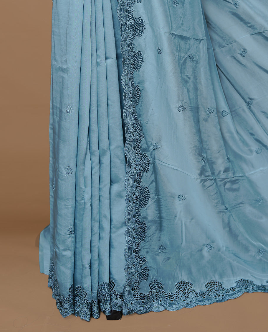 Pastel Teal colour Designer saree featuring Classic Plain body Styled with Thread motifs, Enrich with Thread & scalp border, paired with matching blouse piece.