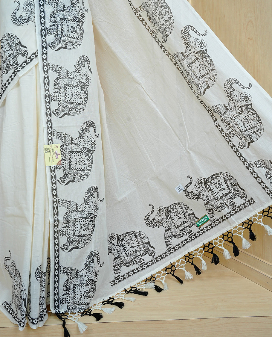 Cream colour Cotton kerala saree featuring Elegant plain body, complemented by Elephant print border, comes with matching blouse piece.